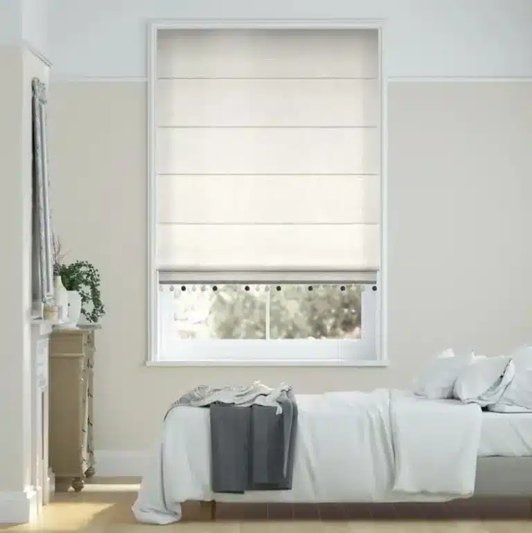 Light Roman blinds in a serene bedroom