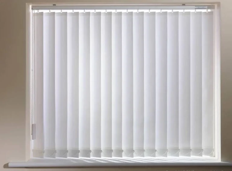 White vertical blinds in a minimalist window setting