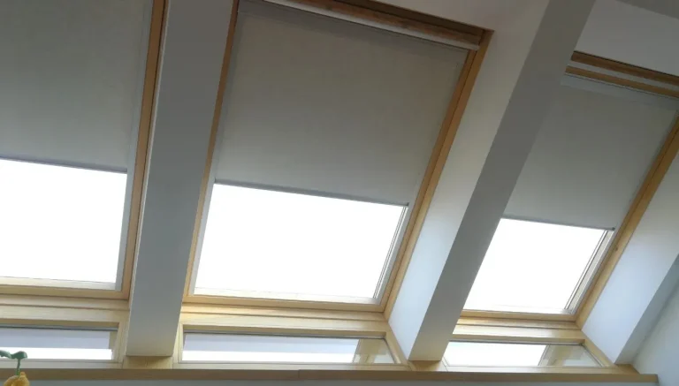 Beige velux blinds on a skylight window