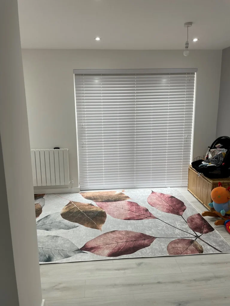 White venetian blinds in a minimalist room