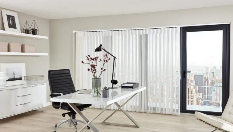 Office space featuring bamboo window shutters for a sleek look