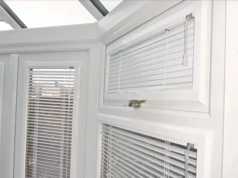 Elegant plantation shutters in a North London living room, enhancing natural light and privacy