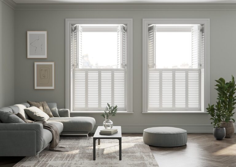 Modern living room featuring white louvered shutters on large windows