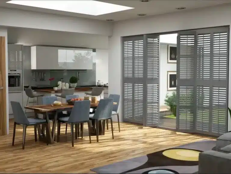 Elegant custom bay window shutters in a living room setting