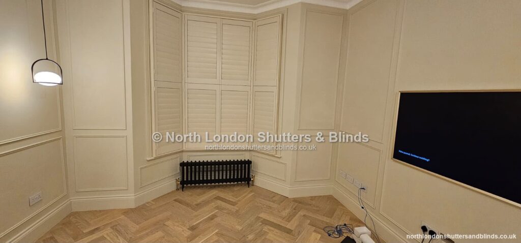 White full height plantation shutters on a bay window by shutter fitters in Barnet, North London