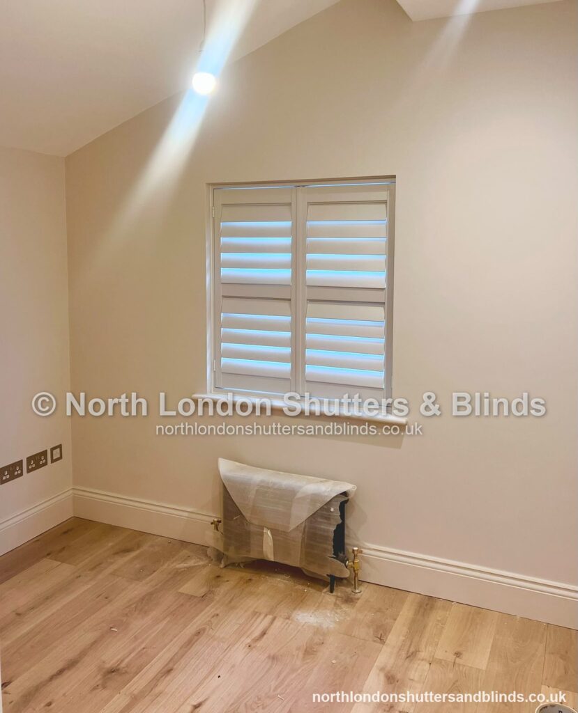 White full height plantation shutters on a new-build window by shutter fitters in Barnet, North London