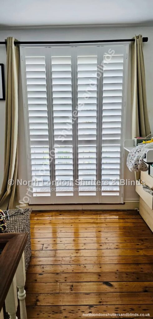 White full height plantation shutters on a patio door by shutter fitters in Barnet, North London