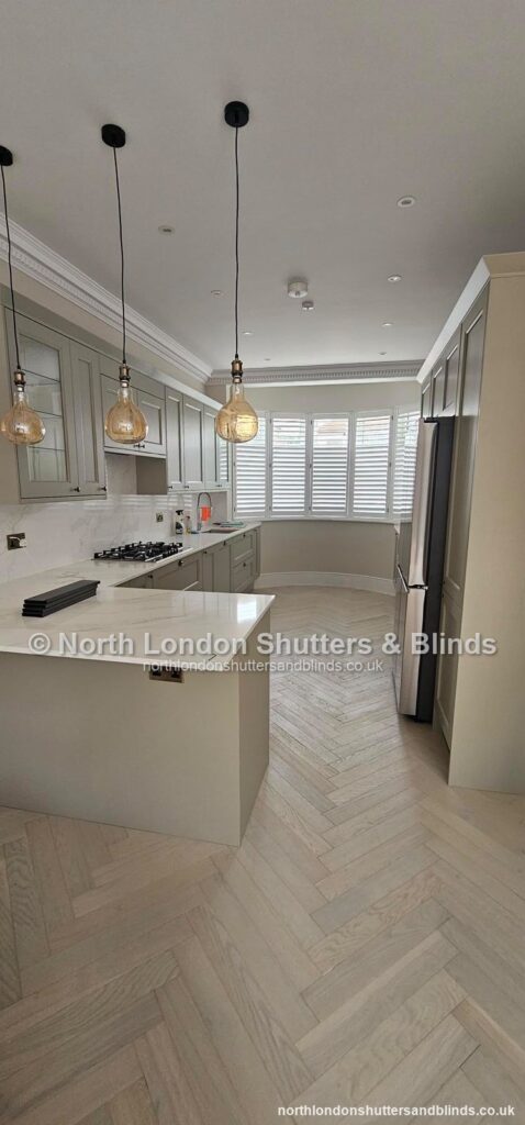 White full height plantation shutters in a kitchen by shutter fitters in Barnet, North London