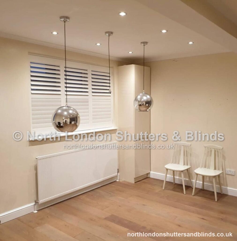 White full height plantation shutters in a kitchen by shutter fitters in Barnet, North London