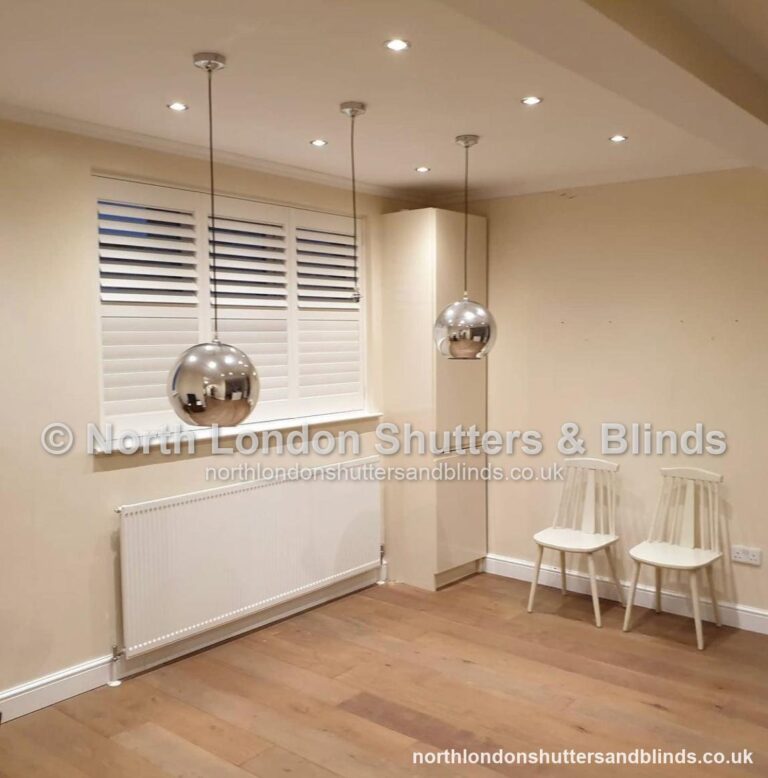 White full height plantation shutters in a kitchen by shutter fitters in Barnet, North London