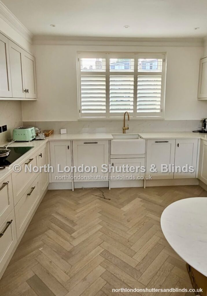 White full height plantation shutters in a kitchen by shutter fitters in Barnet, North London