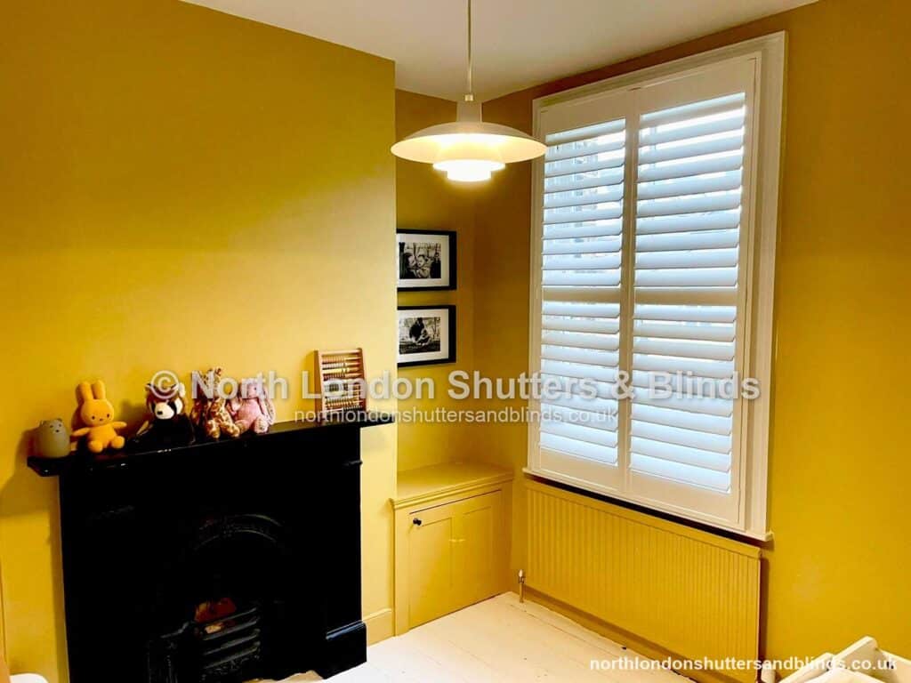 White full height plantation shutters in a nursery by shutter fitters in Barnet, North London