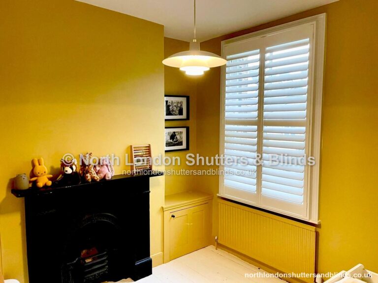 White full height plantation shutters in a nursery by shutter fitters in Barnet, North London